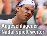 Rafael Nadal mit schmerzverzerrtem Gesicht